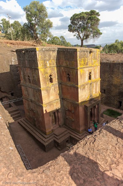 20120402_165451 Nikon D3S 2x3.jpg - The Church of St. George (Amharic: Bete Giyorgis?) is one of eleven monolithic churches in Lalibela, a city in the Amhara Region of Ethiopia. Carved from the rock in the early thirteenth century, it is the most well known and last built of the eleven churches in the Lalibela area, and has been referred to as the "Eighth Wonder of the World".[1] The dimensions of the complex are 25 meters by 25 meters by 30 meters,[2] and there is a small baptismal pool outside the church, which stands in an artificial trench.